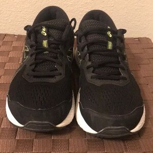 Black and green Asics size 11 shoes in mens.